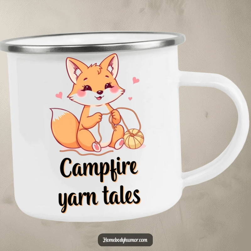Happy fox playfully crafting with yarn camping mug, durable and amusing drinkware for outdoor crafting.
