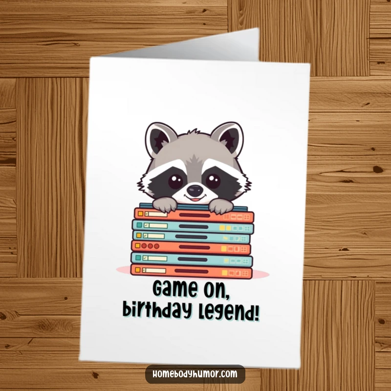 Funny Free Printable Birthday Card: Cheerful raccoon hiding behind board games, ready for party fun, downloadable and unique.
