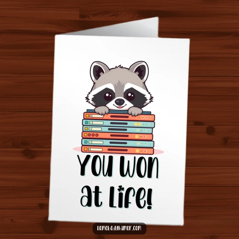 Funny Free Printable Congratulations Card: Raccoon peeking from board games, celebrating a win, perfect for any occasion, downloadable.