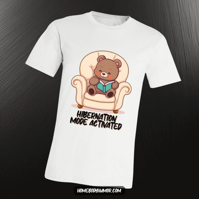 Funny bear t-shirt featuring a cozy bear comfortably reading a book in an armchair, embodying relaxation and humor.